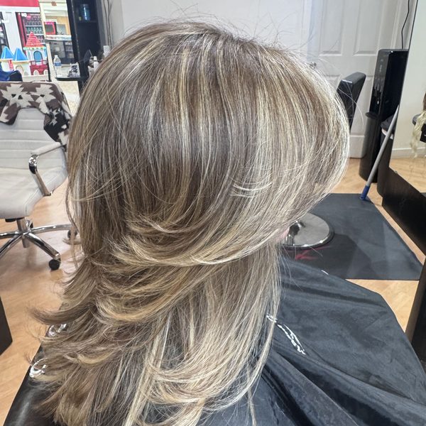 Long blonde layers with dimension